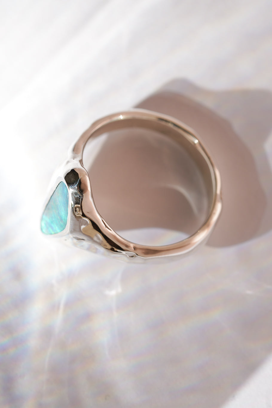 Bright blue boulder opal signet ring