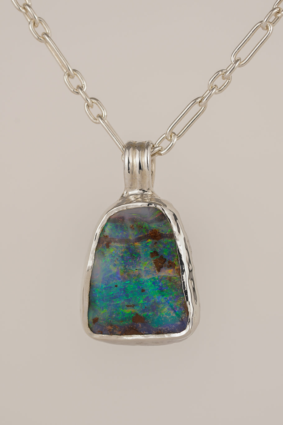 Large blue boulder opal pendant