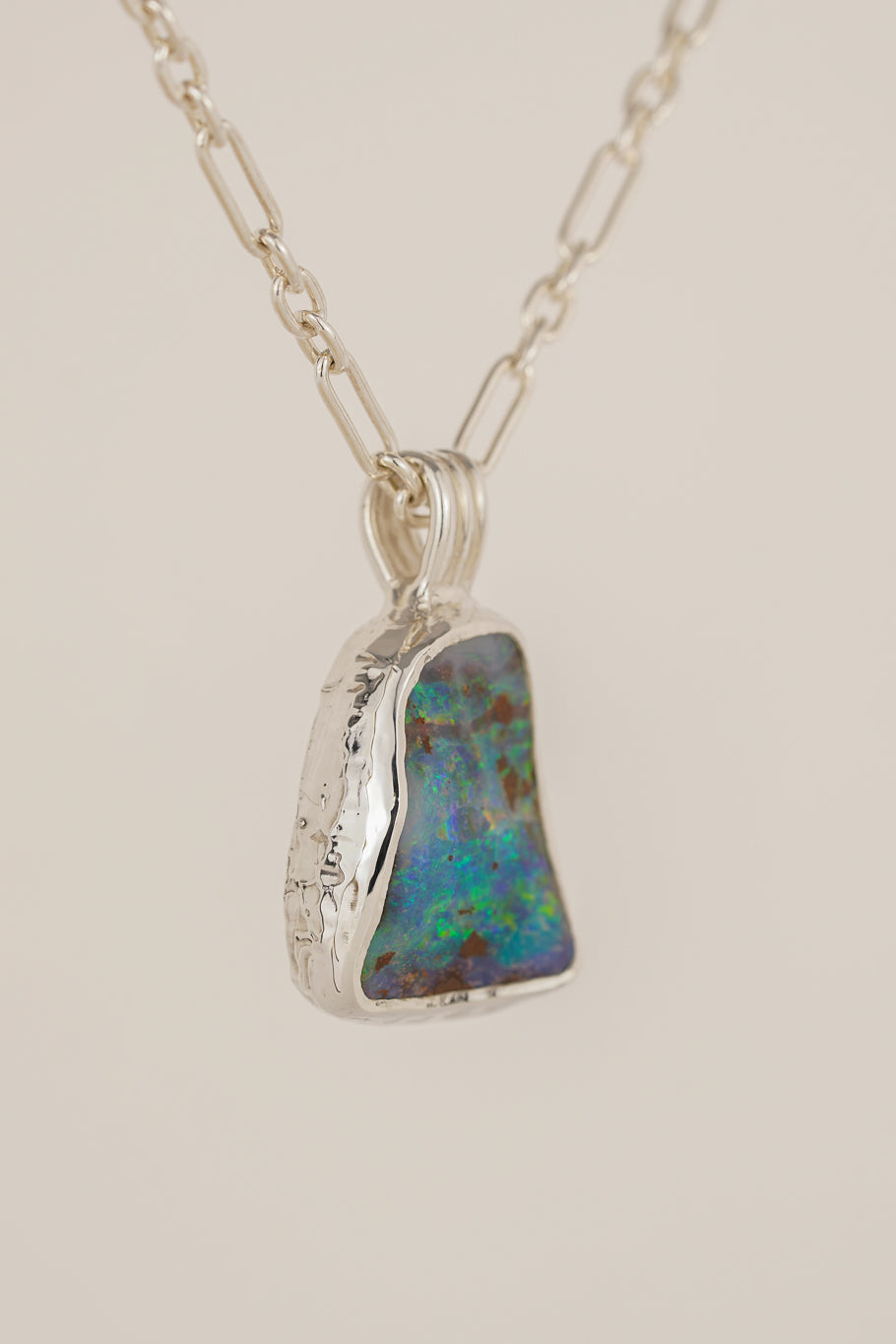 Large blue boulder opal pendant