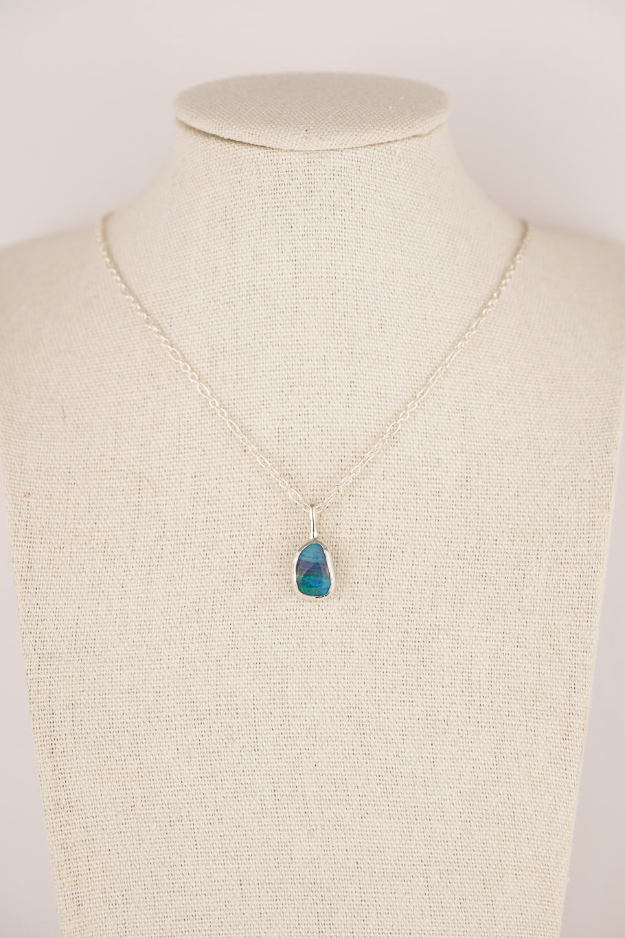 Deep blue boulder opal pendant