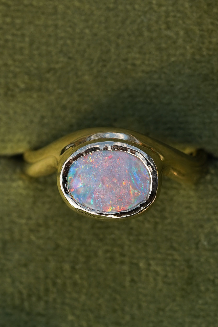 Solid gold pink opal wave ring