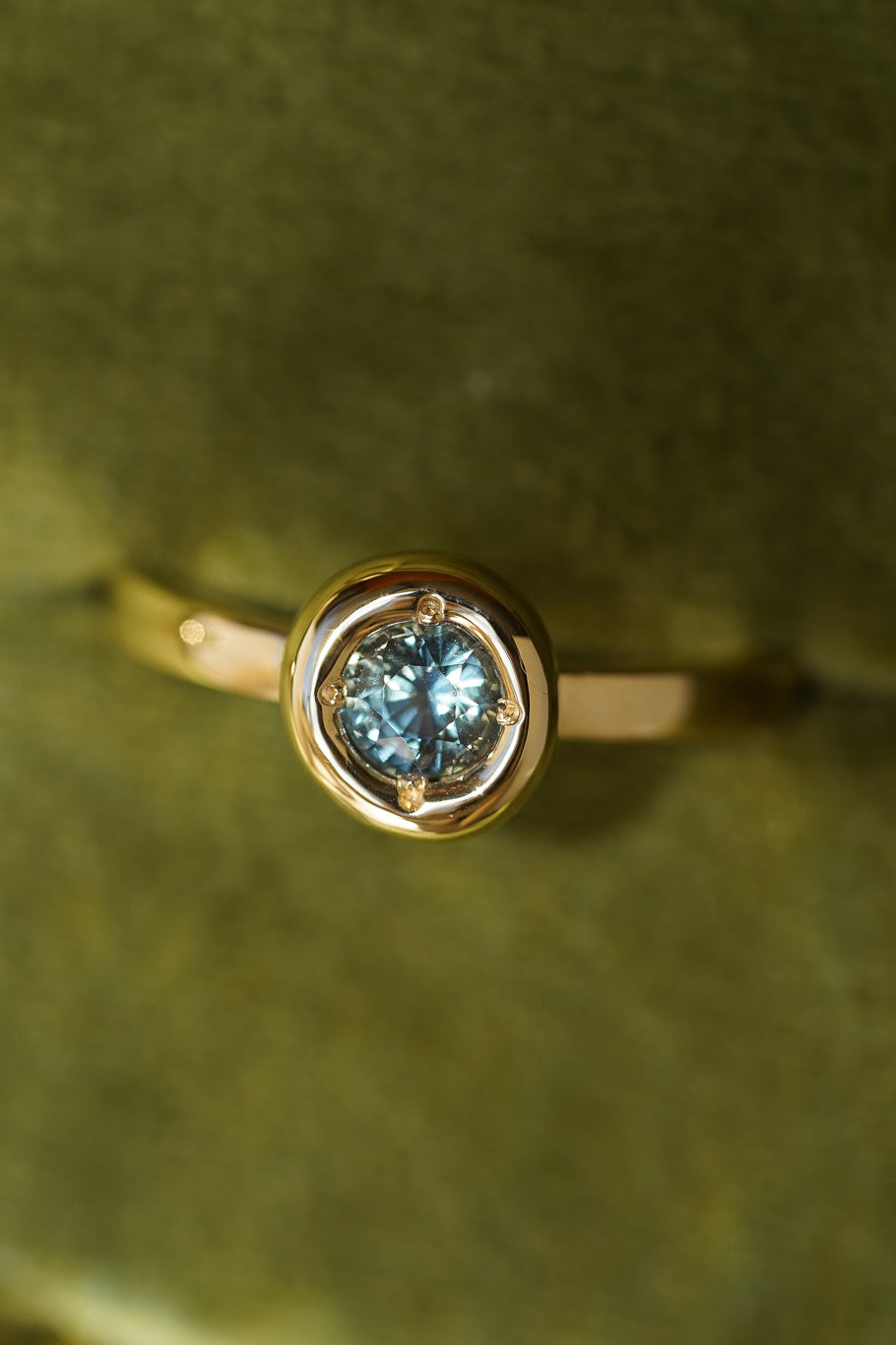 Solid gold blue sapphire solitare