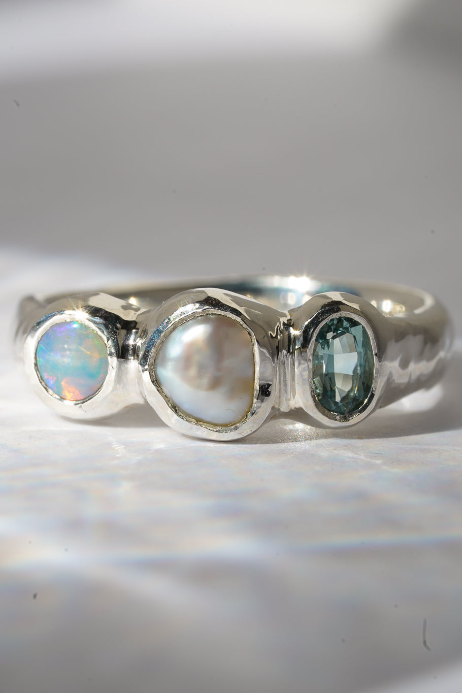 Aquamarine, pearl & crystal opal three stone ring