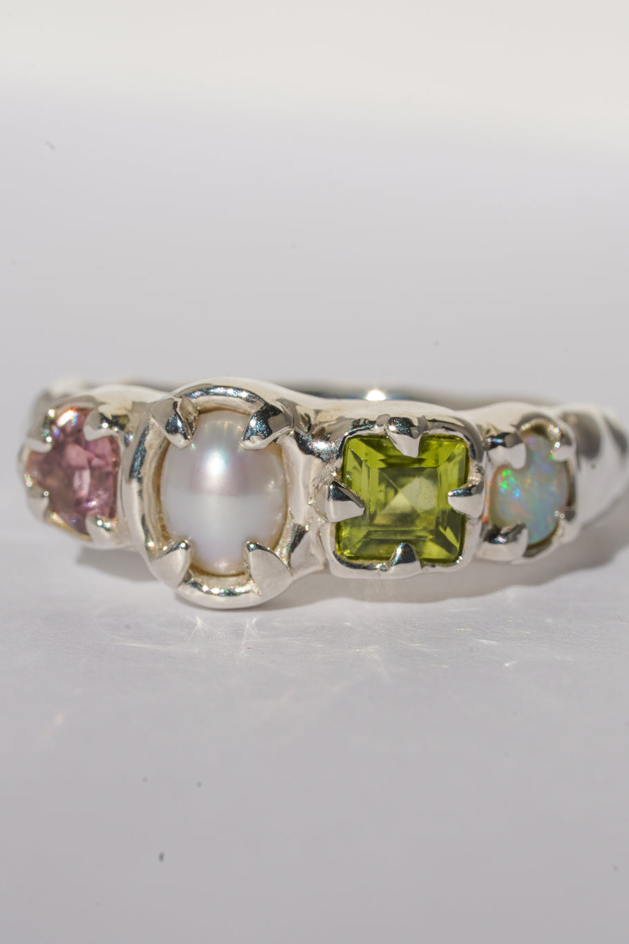 Tourmaline, peridot, opal & pearl ring band