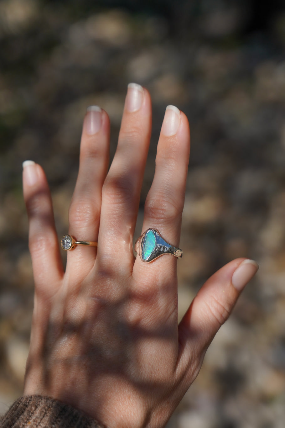 Bright blue boulder opal signet ring