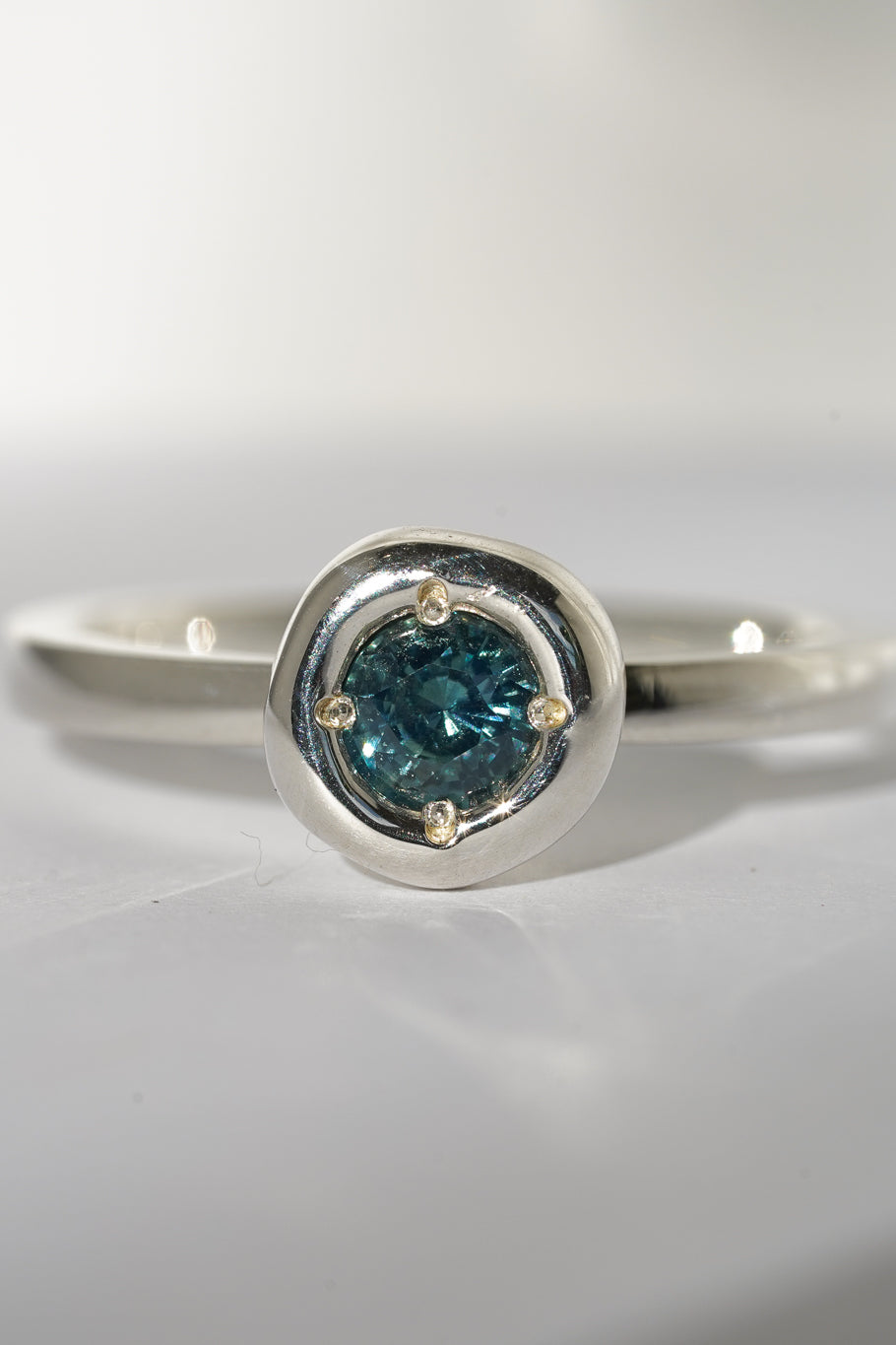Teal Australian sapphire solitare ring