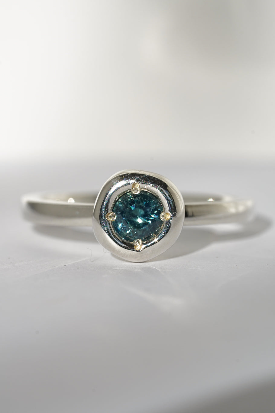 Teal Australian sapphire solitare ring