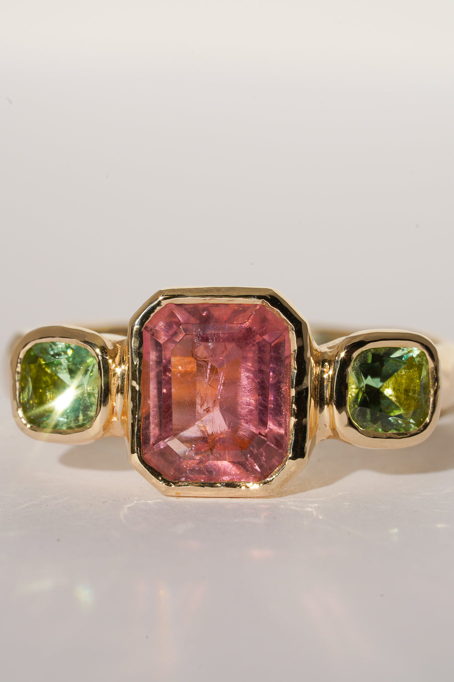 Solid gold pink & green tourmaline trilogy ring