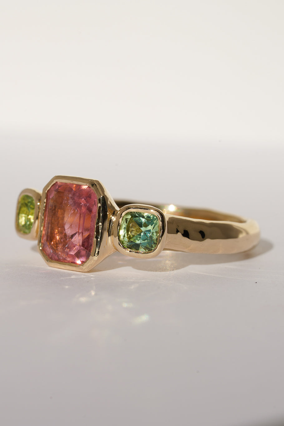 Solid gold pink & green tourmaline trilogy ring