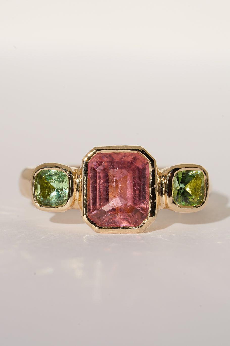 Solid gold pink & green tourmaline trilogy ring