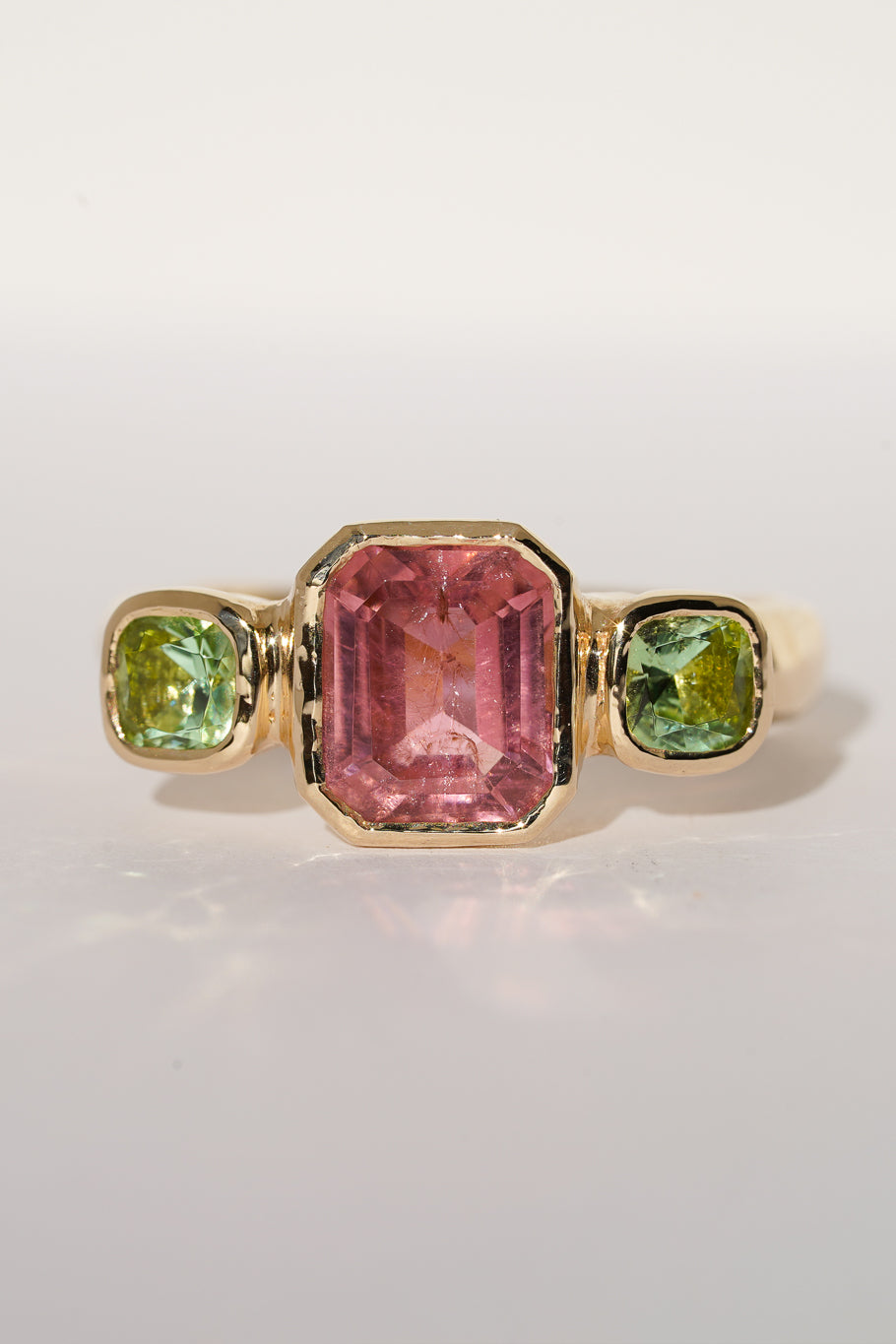 Solid gold pink & green tourmaline trilogy ring