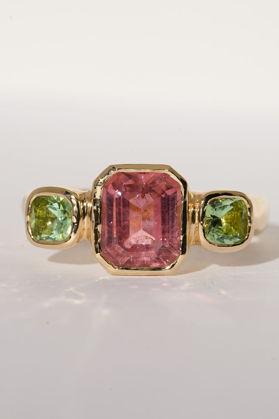 Solid gold pink & green tourmaline trilogy ring