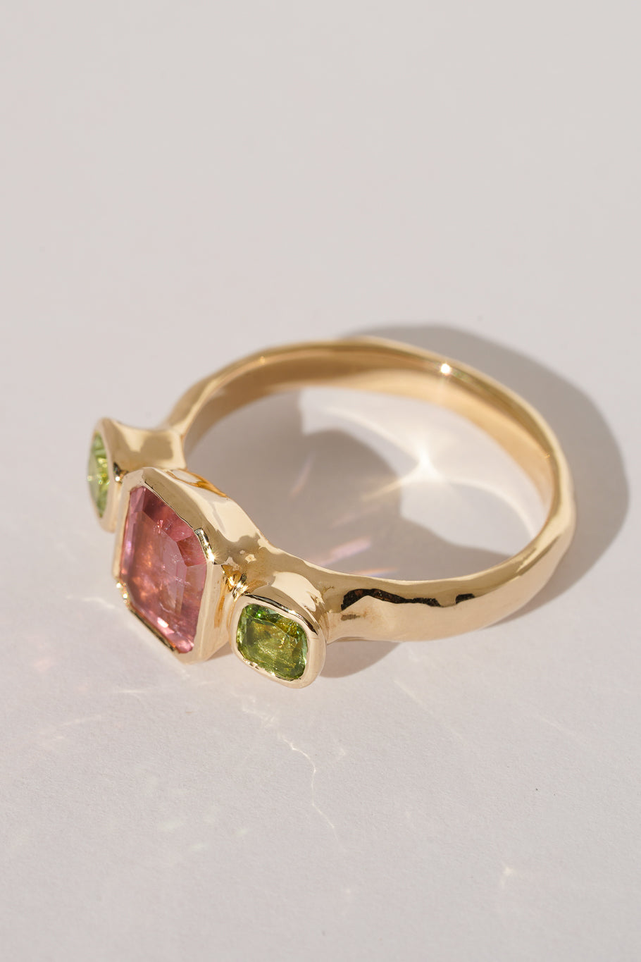 Solid gold pink & green tourmaline trilogy ring