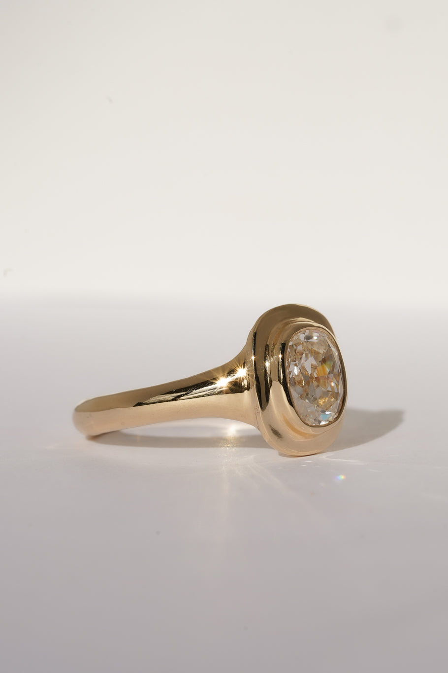 Solid gold old mine cut diamond solitare