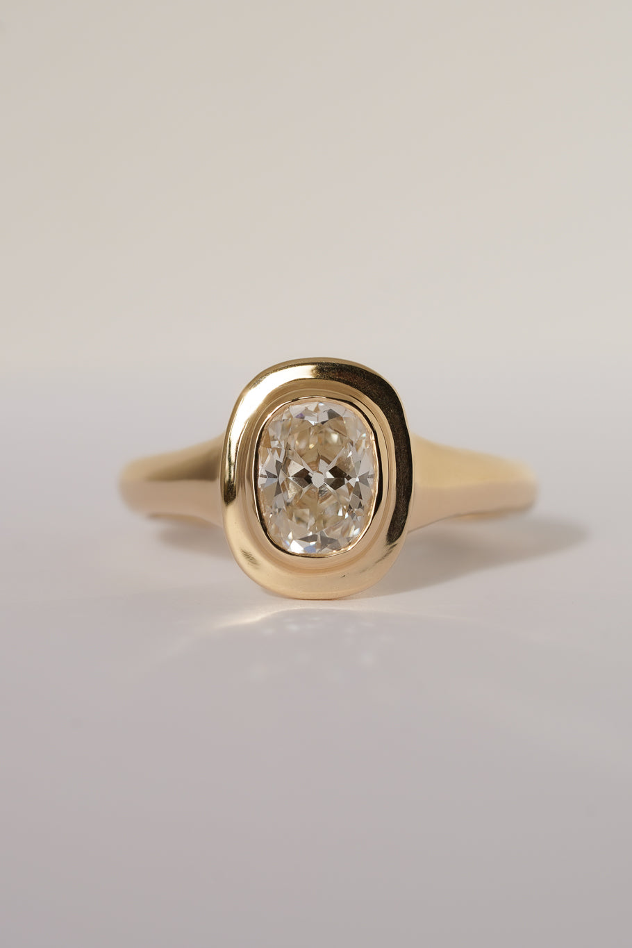 Solid gold old mine cut diamond solitare