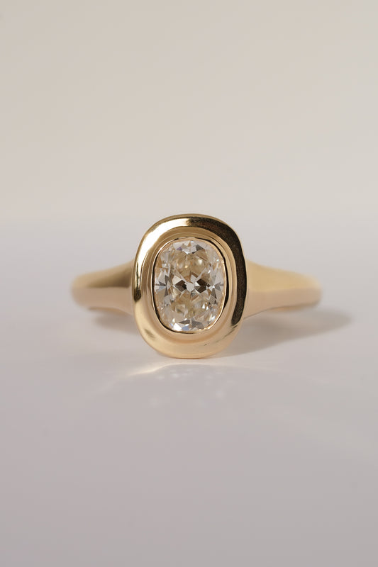Solid gold old mine cut diamond solitare