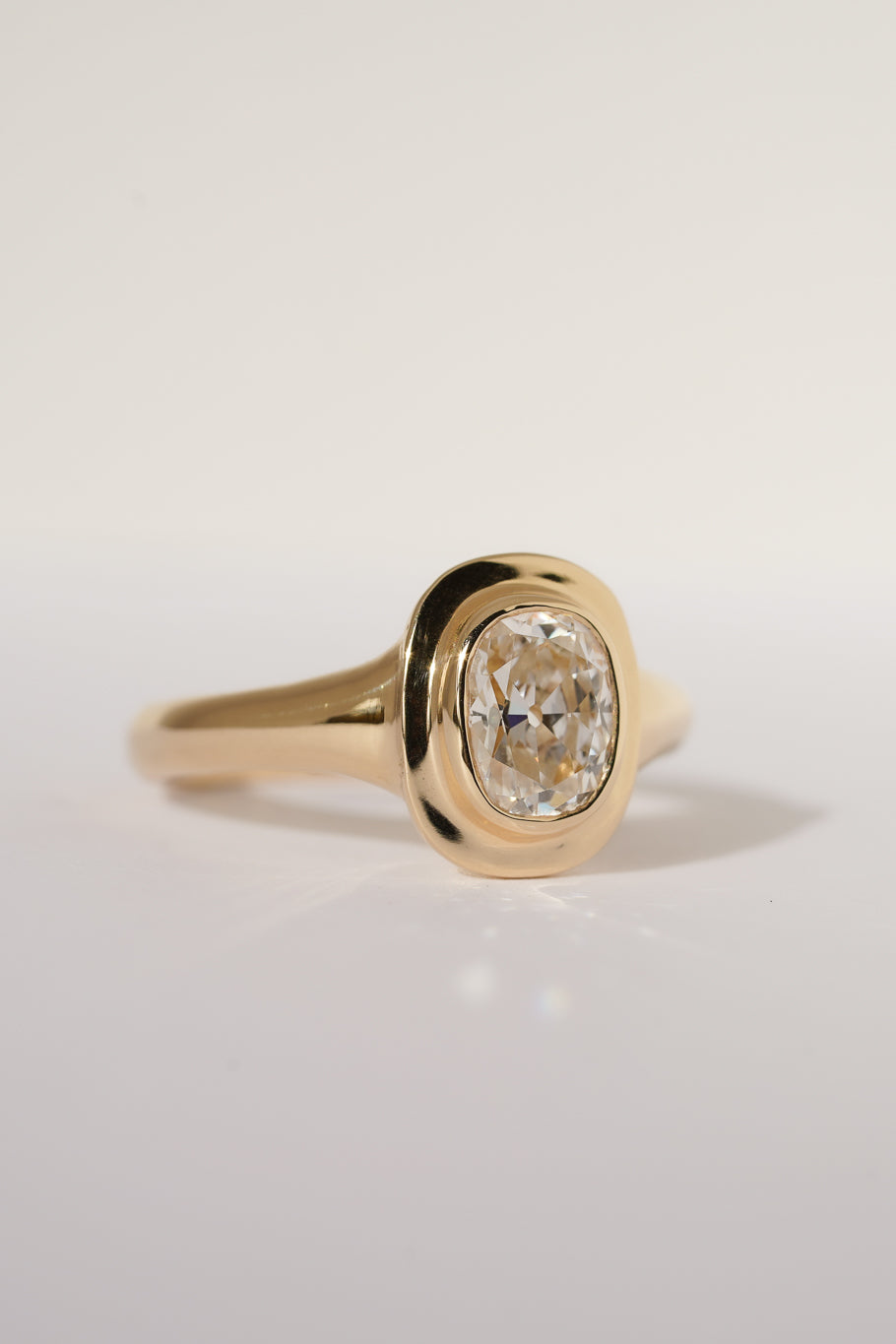 Solid gold old mine cut diamond solitare