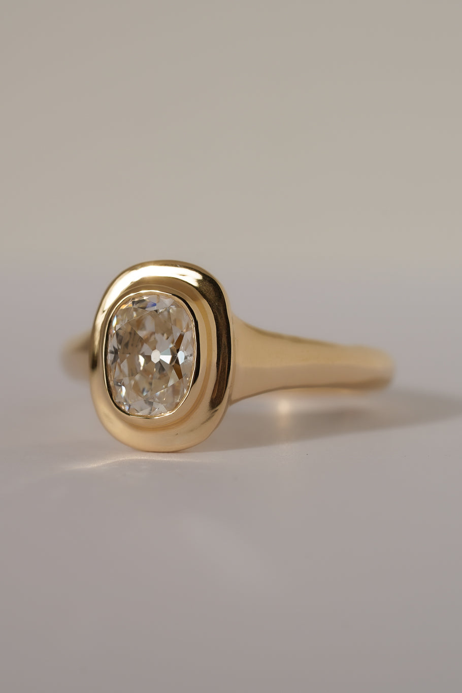 Solid gold old mine cut diamond solitare