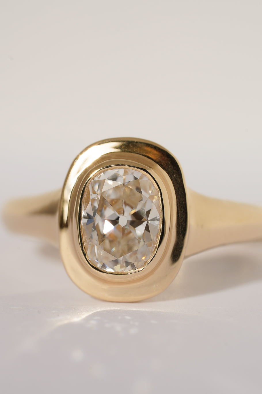 Solid gold old mine cut diamond solitare
