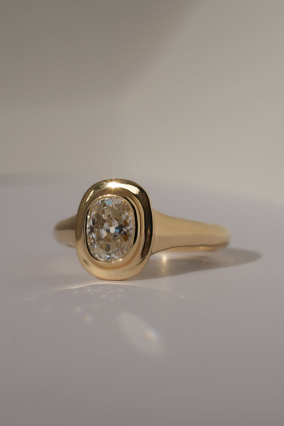 Solid gold old mine cut diamond solitare