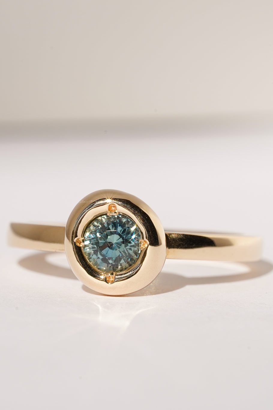 Solid gold blue sapphire solitare