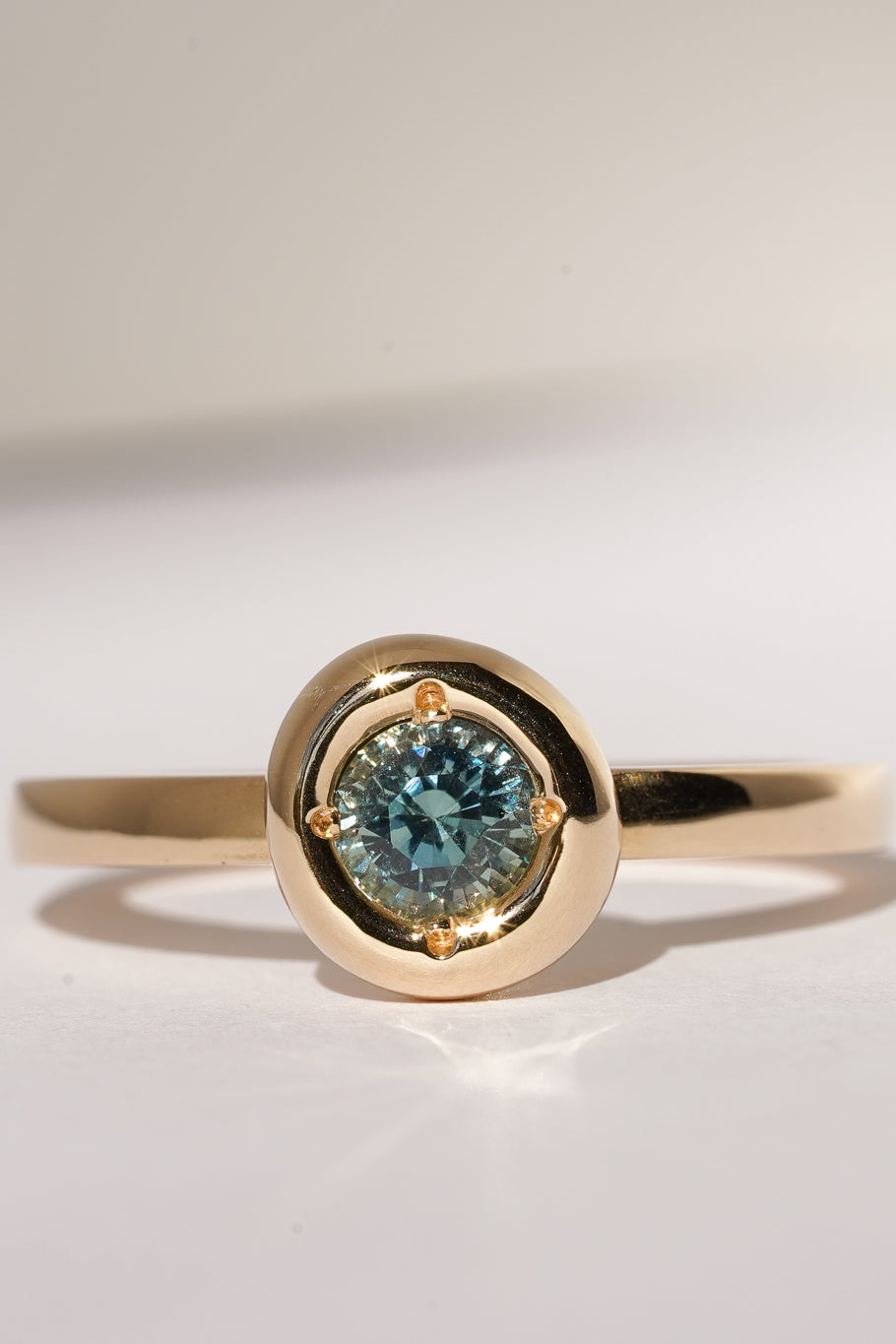 Solid gold blue sapphire solitare