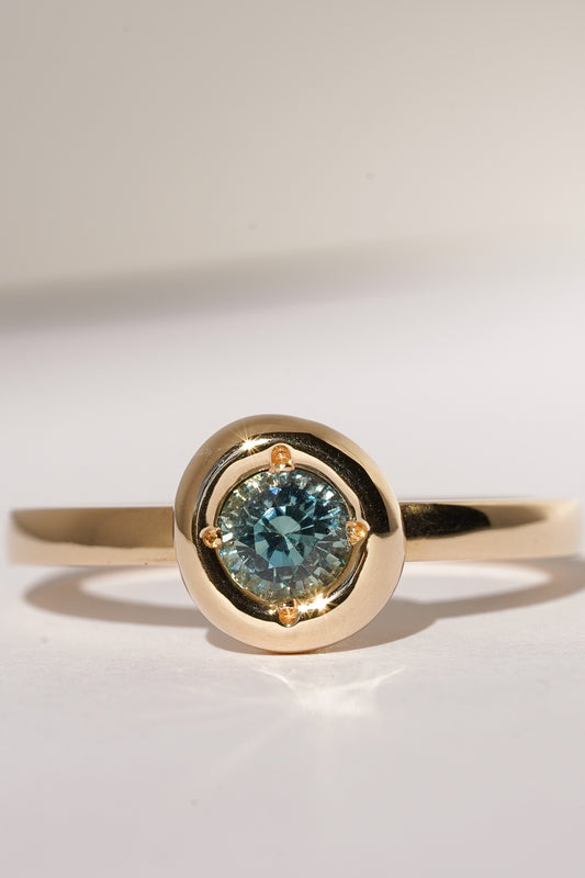 Solid gold blue sapphire solitare