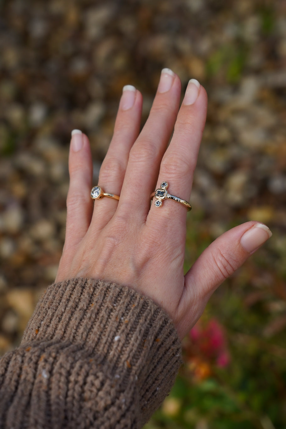 Solid gold blue sapphire trilogy ring