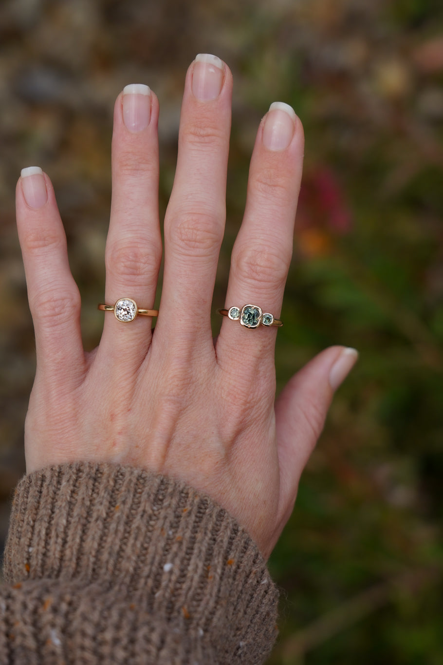 Solid gold green sapphire trilogy ring
