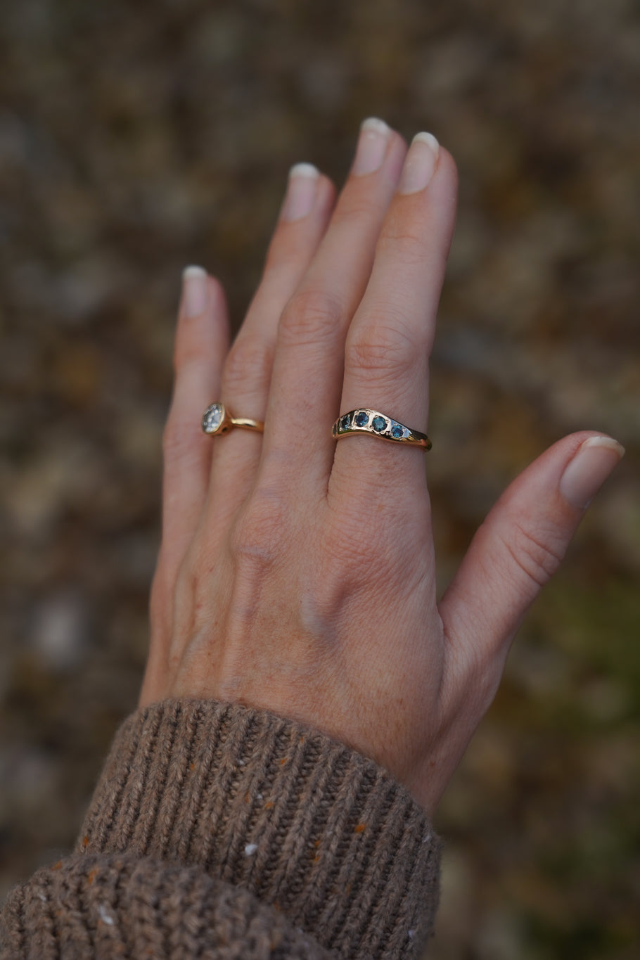 Solid gold teal sapphire stacking band