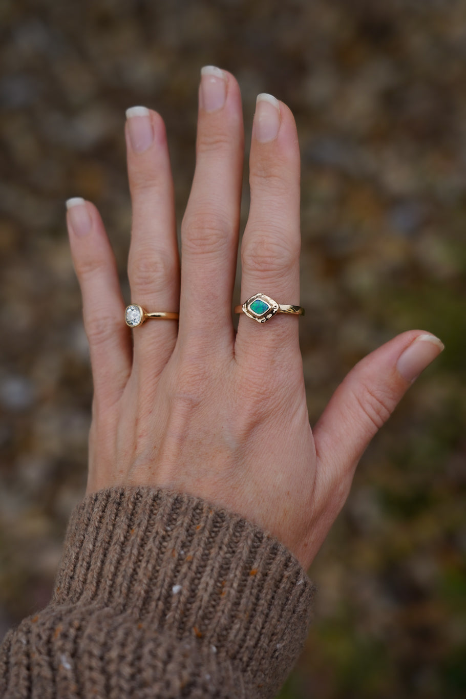 Solid gold blue-green boulder opal ring