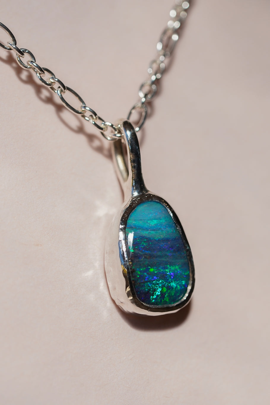 Deep blue boulder opal pendant