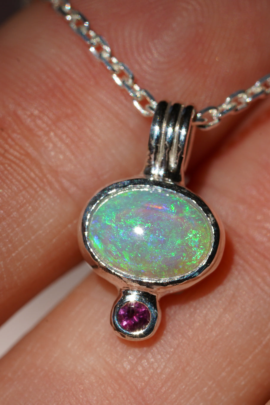 Blue crystal opal and ruby pendant