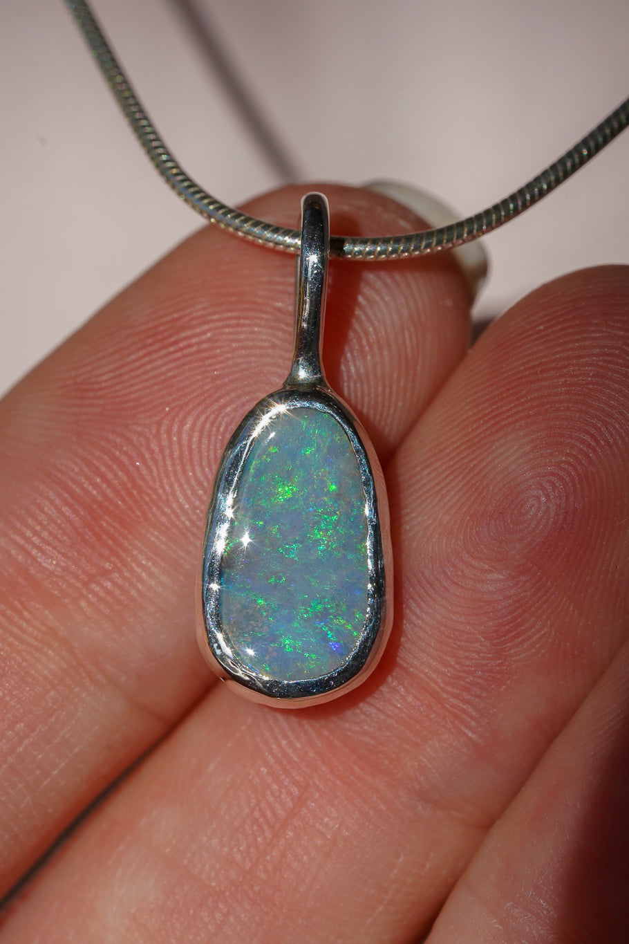 Blue boulder opal pendant