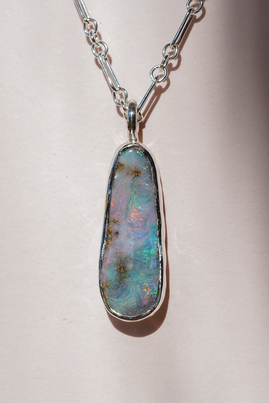 Pink & blue boulder opal pendant