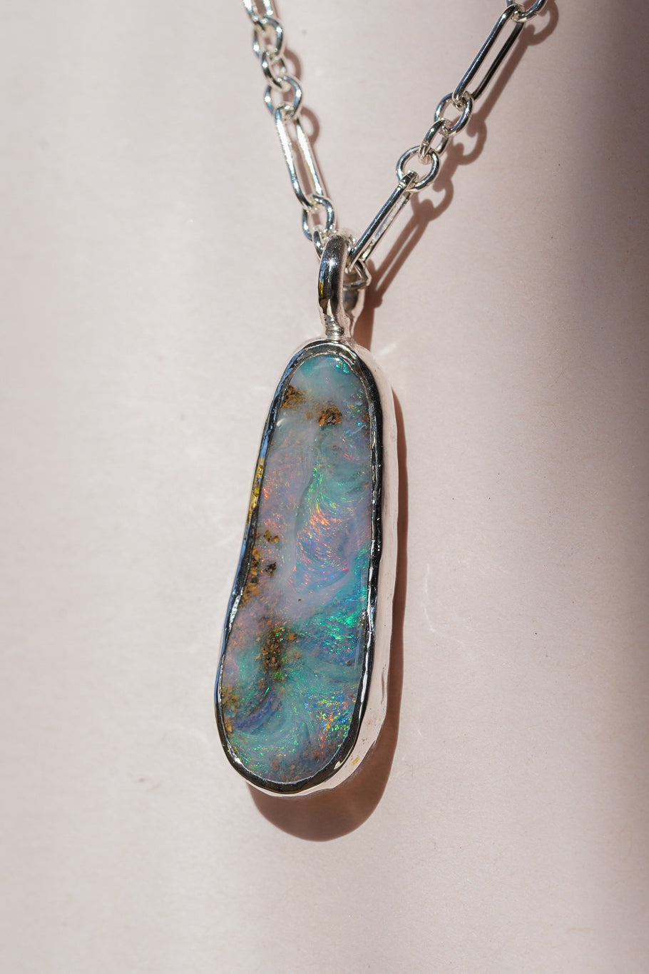 Pink & blue boulder opal pendant