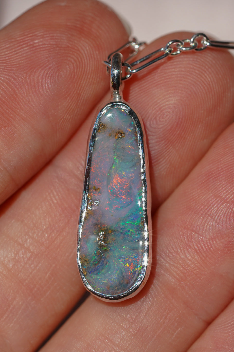 Pink & blue boulder opal pendant