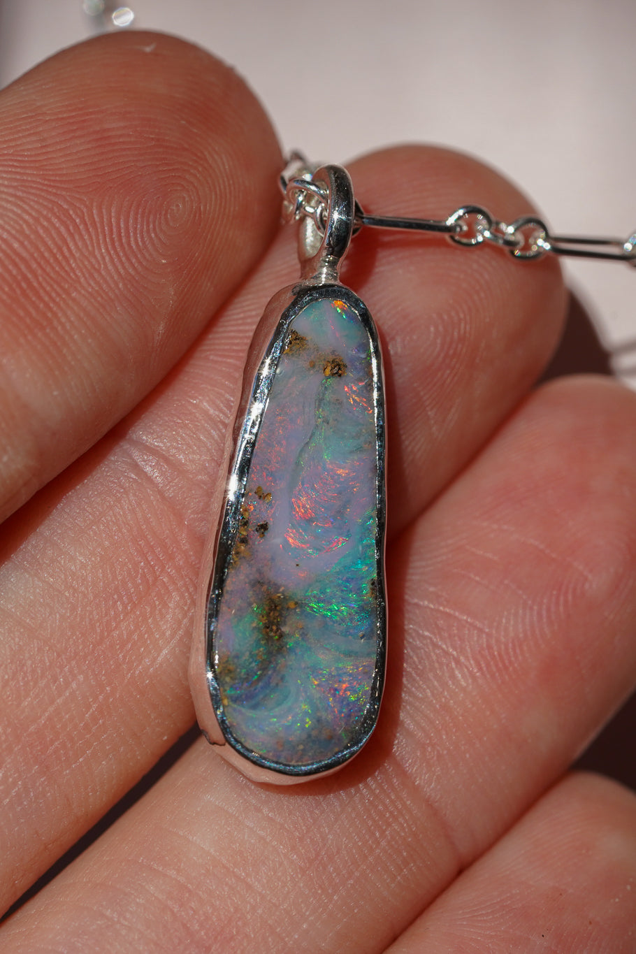 Pink & blue boulder opal pendant