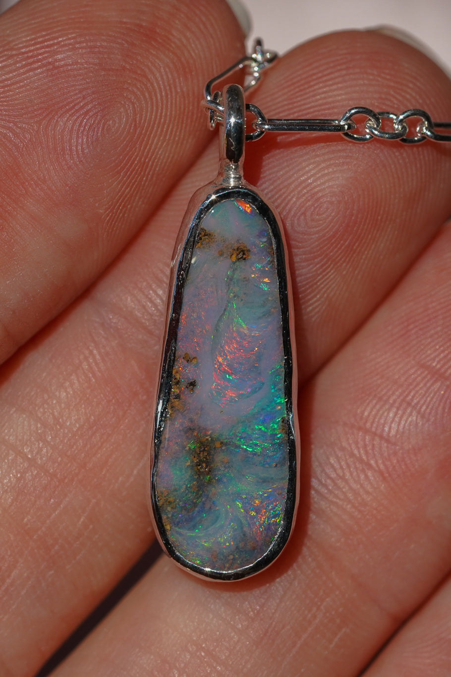 Pink & blue boulder opal pendant