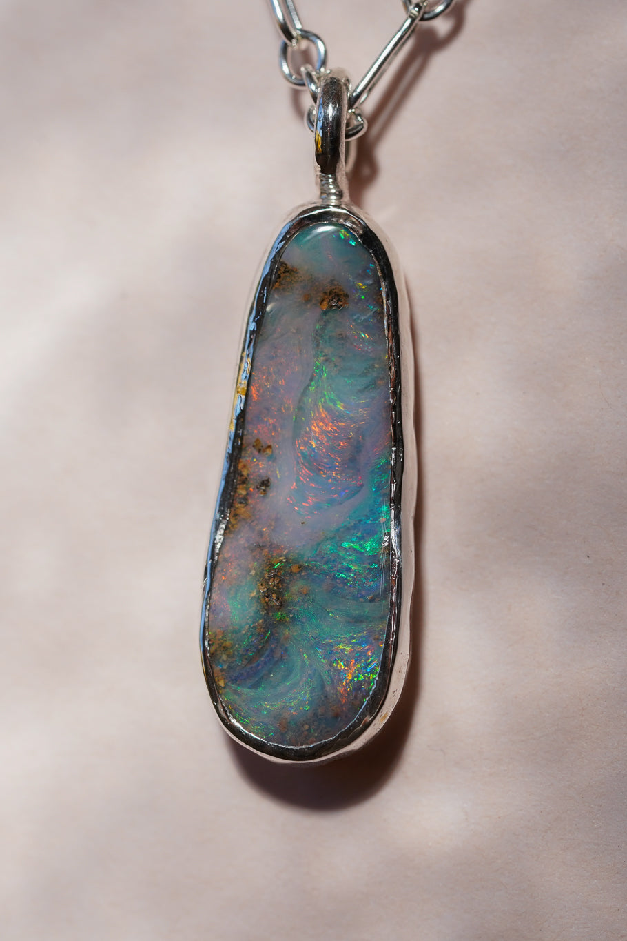 Pink & blue boulder opal pendant