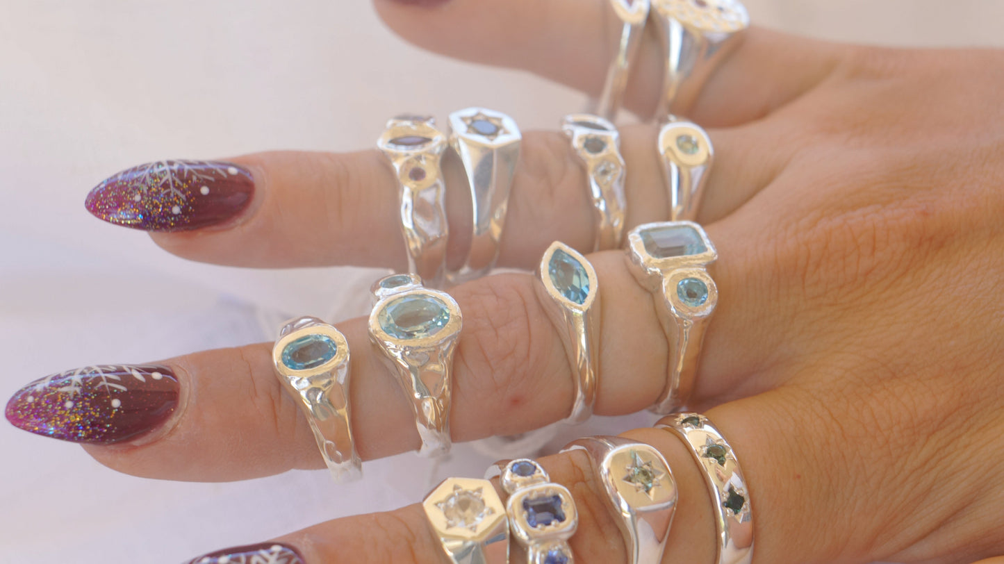 Oval blue topaz signet - silver