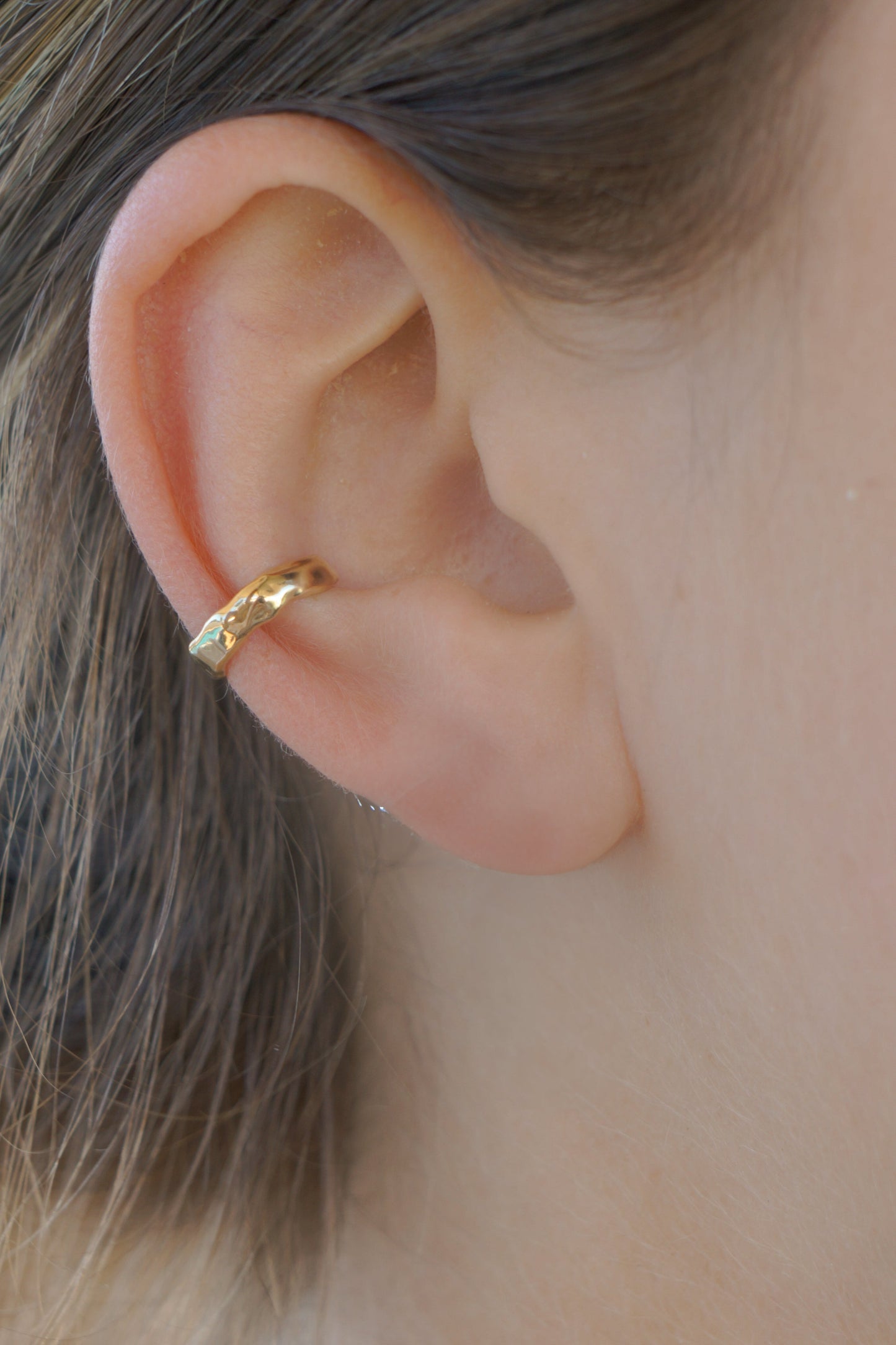 Solid gold molten ear cuff