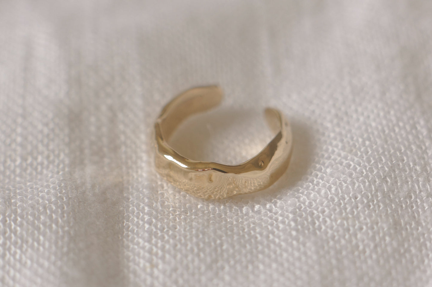 Solid gold molten ear cuff