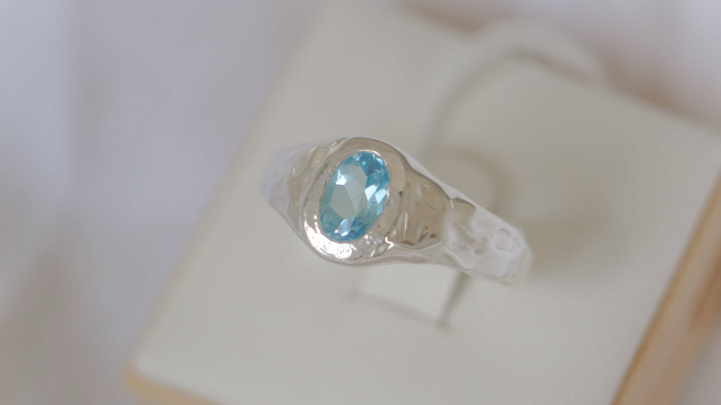 Oval blue topaz signet - silver