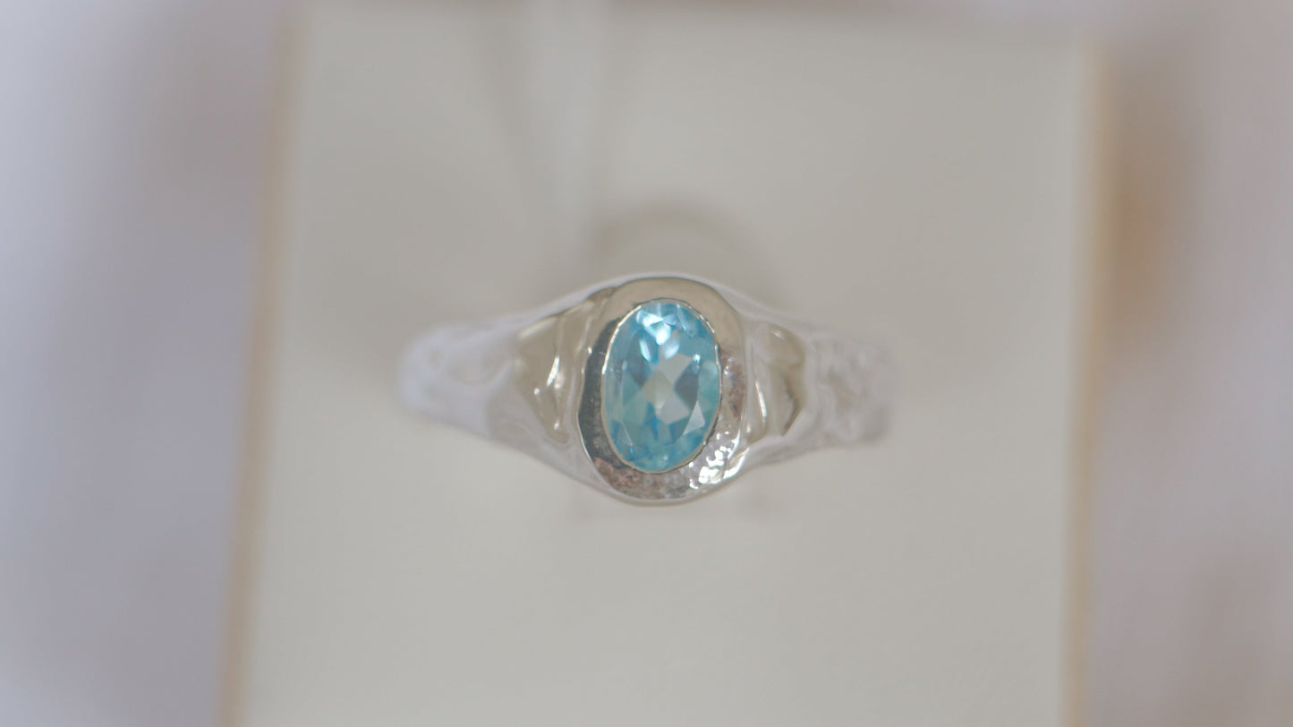 Oval blue topaz signet - silver