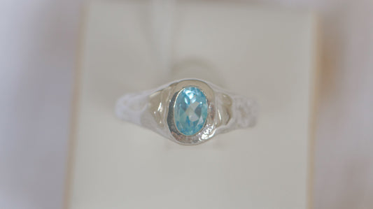 Oval blue topaz signet - silver
