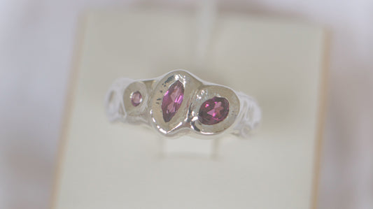 Rhodolite garnet three stone band - silver
