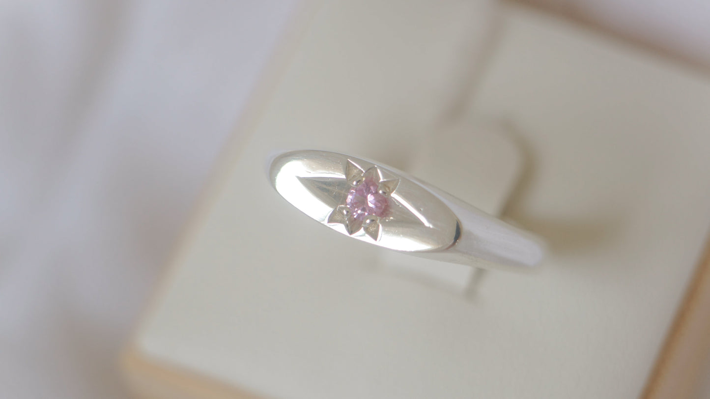 Slim oval signet with pink sapphire