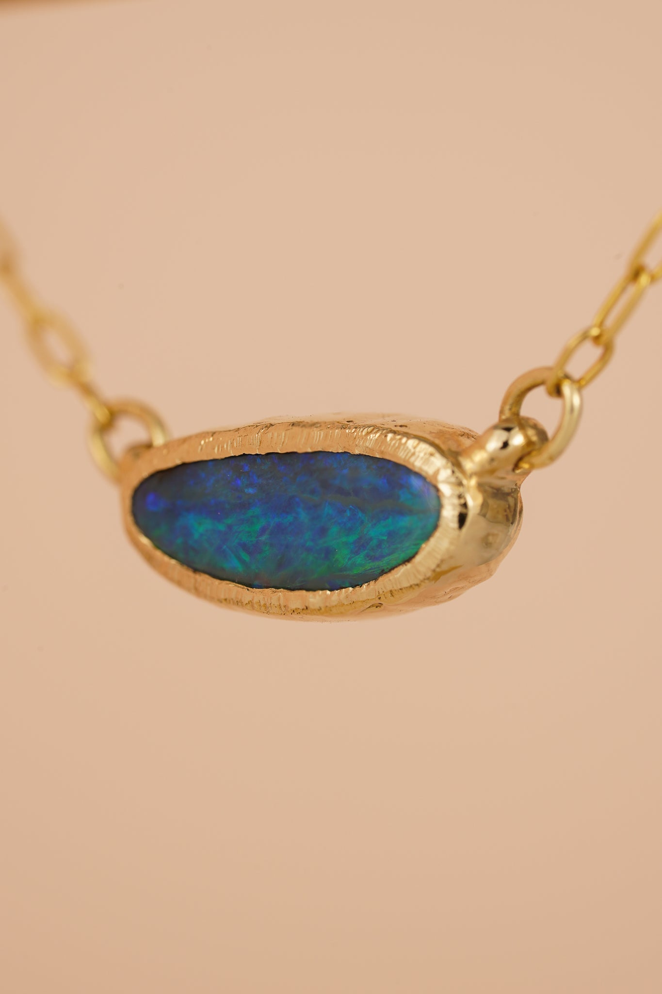 Solid gold east west boulder opal choker necklace