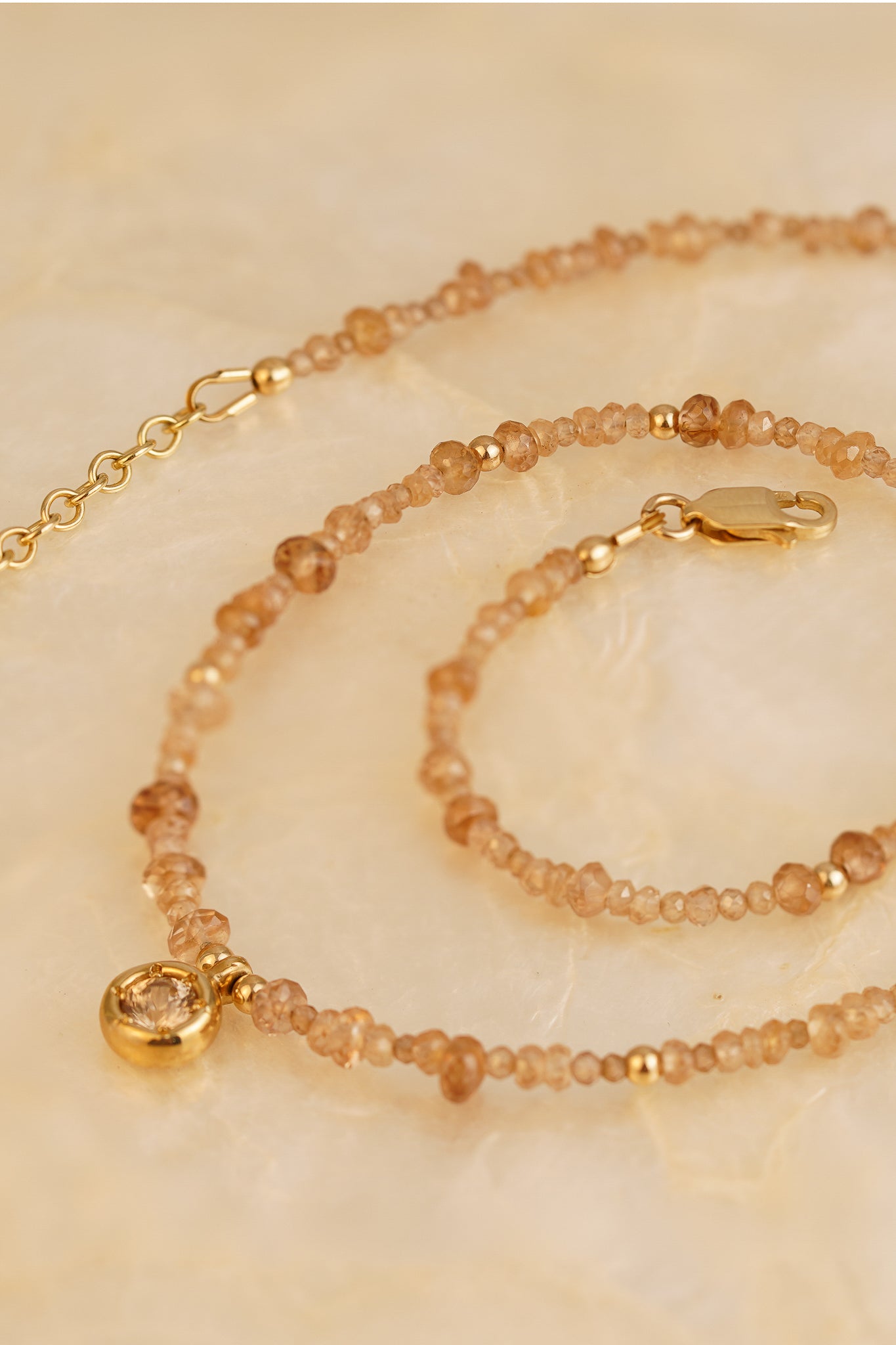 Solid gold mixed champagne zircon beaded necklace with pinkish-champagne zircon pendant